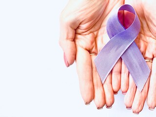 World epilepsy day inscription, purple ribbon in lady hands, disease awareness