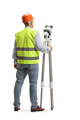 Rear view shot of a geodetic surveyor with a measuring equipment