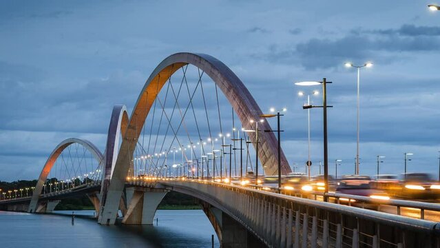 Time lapse view of rush hour traffic on JK Bridge in Brasilia, Federal District, capital of Brazil, zoom out.