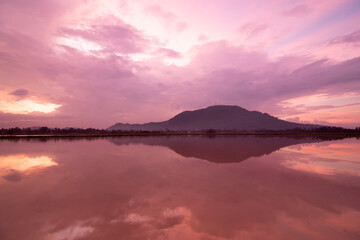 Beautiful reflection of the hill in water