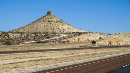 Fototapeta na wymiar Squawteat Peak in Bakersfield, Texas - Pecos County - is a breast-shaped hill also named Nipple Mountain or 