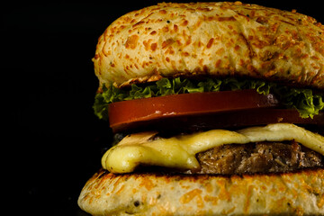 Fresh hamburger on black background