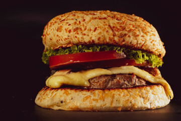 Fresh hamburger on black background