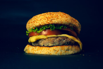Fresh hamburger on black background