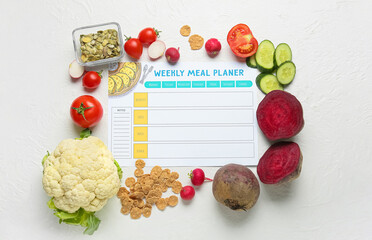 Weekly meal planner and different healthy products on light background - obrazy, fototapety, plakaty