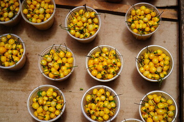 Small yellow chili peppers in a street market in Brazil, Brazilian spicy pepper Pimenta Cheiro (capsicum chinense, adjuma)