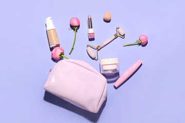 Bag with cosmetics, facial massage tool and rose flowers on lilac background