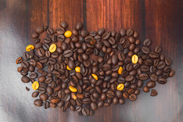 coffee beans on a wooden table background.