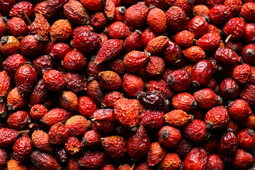 Dried rose hip berries as background