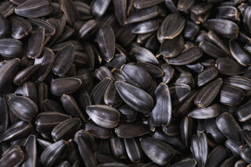 Black sunflower seeds. To create backgrounds, textures, presentations and backgrounds.