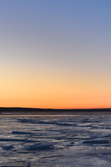 Fototapeta na wymiar Sunset over the winter lake