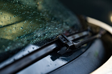 Raindrops on car windows, car after washing, wet car windows.