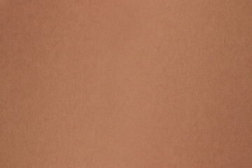 Brown paper background. Brown cardboard.