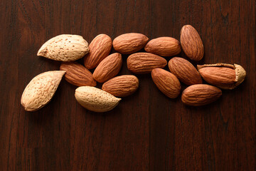 almond nuts healthy food on wood background,nutshell almond