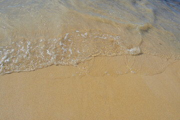 Limite sable mer sur une plage