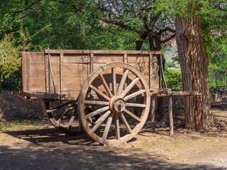 Fototapeta na wymiar Old wooden cart in a village near Purmamarca, Jujuy Province, Northern Argentina