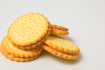 Cheese-flavored biscuits, photo from the top corner, isolated on a white background