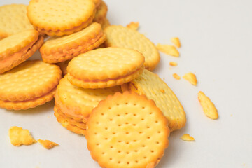 Cheese-flavored biscuits, photo from the top corner, isolated on a white background