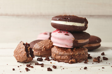 American whoopie pie desserts on white wooden planks