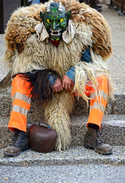 young man wearing traditional Valasian mask of Tsch&auml;gg&auml;tt&auml;, International Alphorn Festival, Nendaz, canton Valais, canton Wallis, Switzerland, Europe