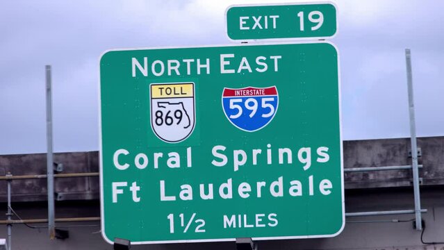 Street sign on the highway of Florida showing Ft Lauderdale and Coral Springs - travel photography