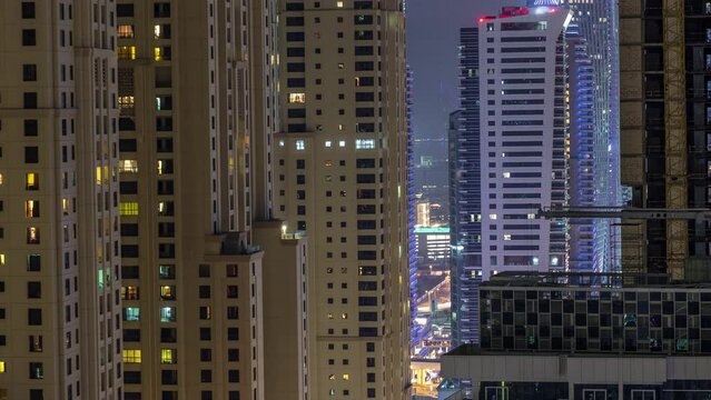 Night illumination of Dubai Marina aerial timelapse, UAE.