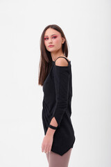 Fototapeta premium Fashion shooting in studio . Professional model , fashionable clothes and style, new collection. stylish look