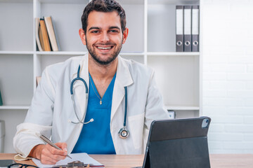 attractive young doctor working with computer