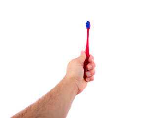 Brush for toothpaste at in the man hand