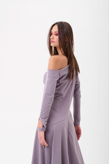 Fototapeta premium Fashion shooting in studio . Professional model , fashionable clothes and style, new collection. stylish look