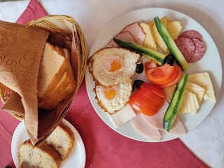 Cheese with vegetables, eggs and bread 