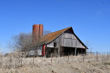 Old Barn and Silo in a Farm Field