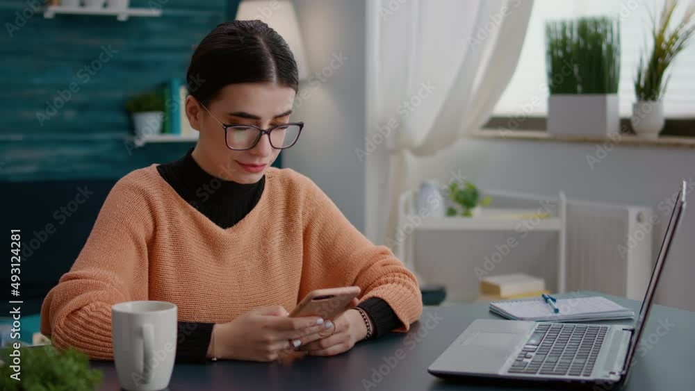 Poster college student browsing internet on smartphone to do reseacrh for online school assignment. woman u