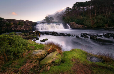 Beautiful nature scenery with waterfall on river Erriff with mountains in the background at...