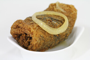 fried rollmops with onion
