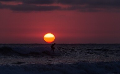 sunset surfing