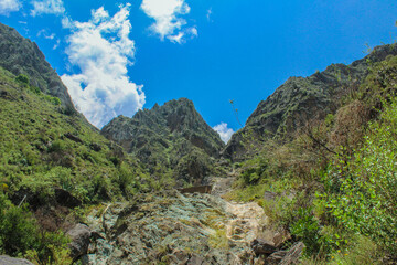 mountains with blue sky and clouds