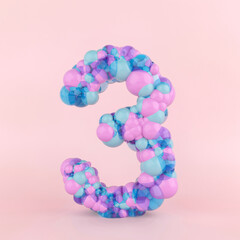 Creative number three 3 concept made of colorful pastel balloons. Balloon font concept on pastel pink background.