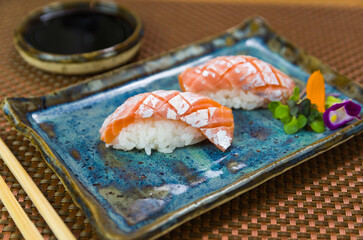 Plate with two elegant nigiri sushi (nigirizushi)