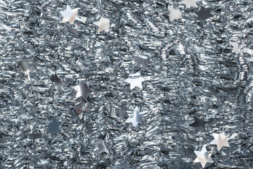 Full frame of silver metallic tinsel garland for Christmas Tree decorations
