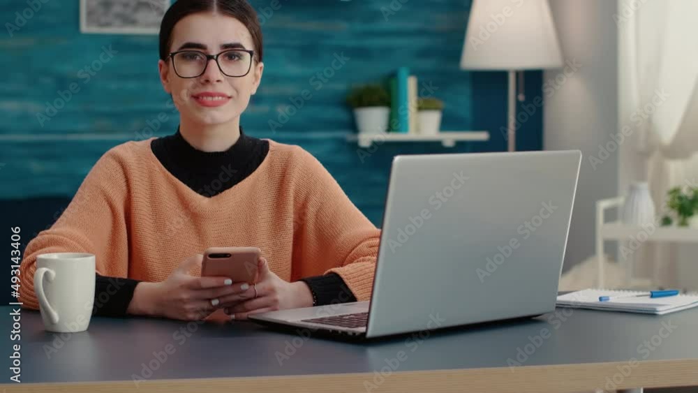 Poster portrait of woman working on smartphone to learn for exam, browsing internet to take notes on school