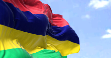 Detail of the national flag of Mauritius waving in the wind on a clear day