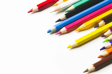 Colored pencils and white paper. Children's creativity. Template for drawing.