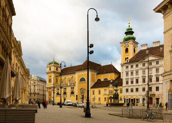 View of medieval Catholic church Schottenkirche and Schottenstift monastery on Freyung square in...