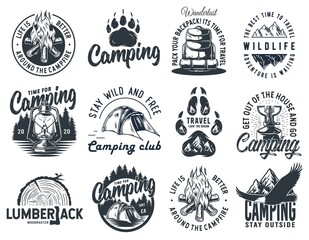 Set of monochrome camping and travel emblems, including campfire, outdoor lantern, forest wild life and eagle
