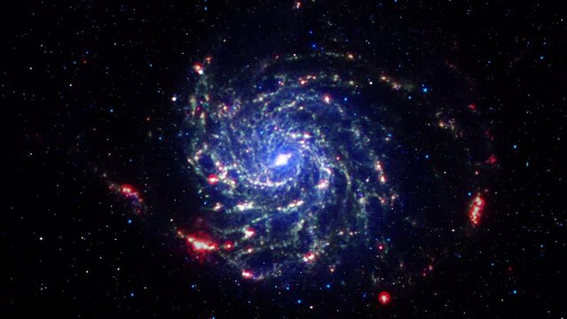 Seamless loop galaxy exploration through outer space towards glowing milky way galaxy. 4K looping animation of flying through glowing Messier 101 Elements furnished by NASA image. 
