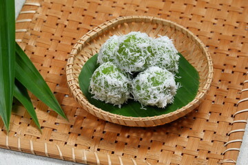 Klepon or kelepon is one of Indonesia's traditional snack made from glutinous rice flour which is shaped like small balls and filled with brown sugar