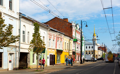 Fototapeta na wymiar Old buildings on Krestovaya Street, main street of Rybinsk, Russia