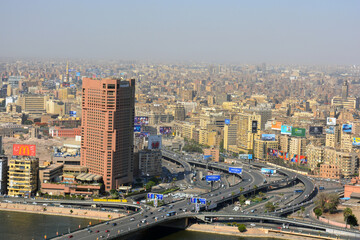 Aerial view of streets and bridges near Cairo city downtown with the traffic of cars and...
