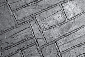 abstract creative background: lined gypsum plaster, toning, short focus.